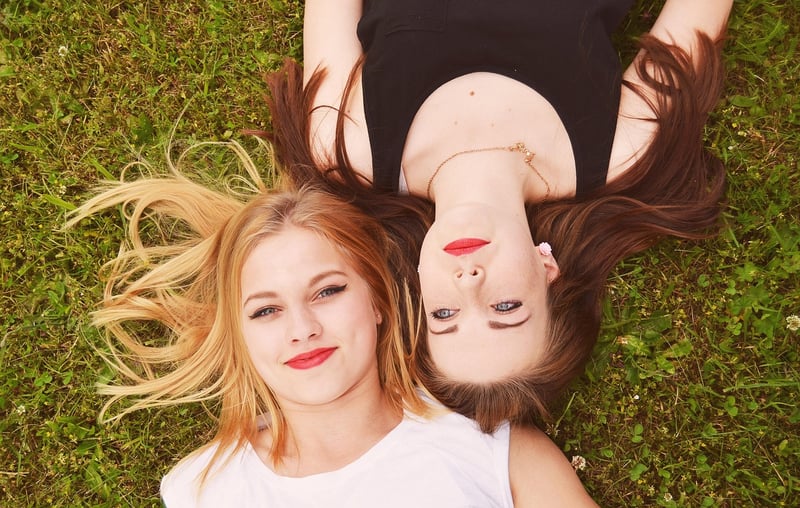 Gossiping women sharing secrets